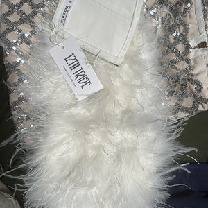 Strapless faux fur from 12 tribe shown with tags